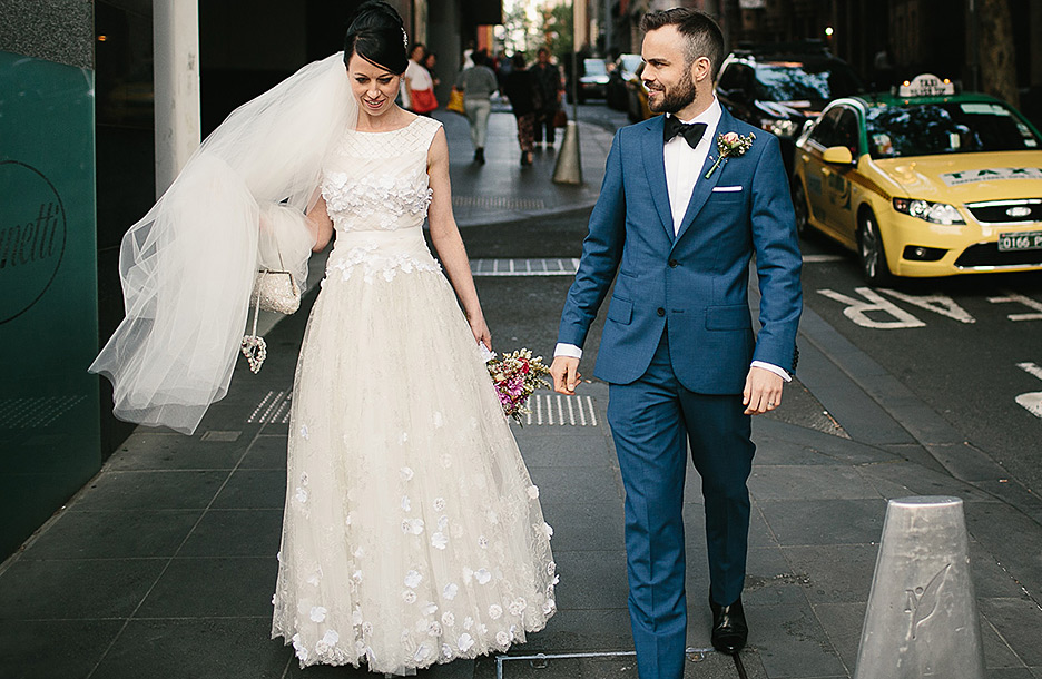 Silk tulle, silk satin, and Chantilly lace gown, with hand beading and appliqué flowers, and net underskirt