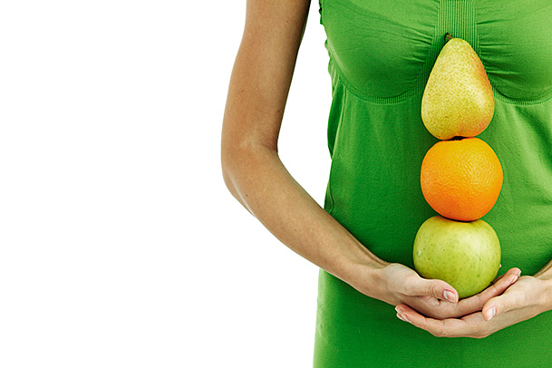 Fruit pile in a woman’s hands - Julie Goodwin Couture.jpg