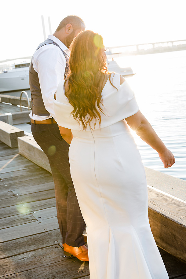 Danielle Sady and husband by the sea (dress by Julie Goodwin Couture)